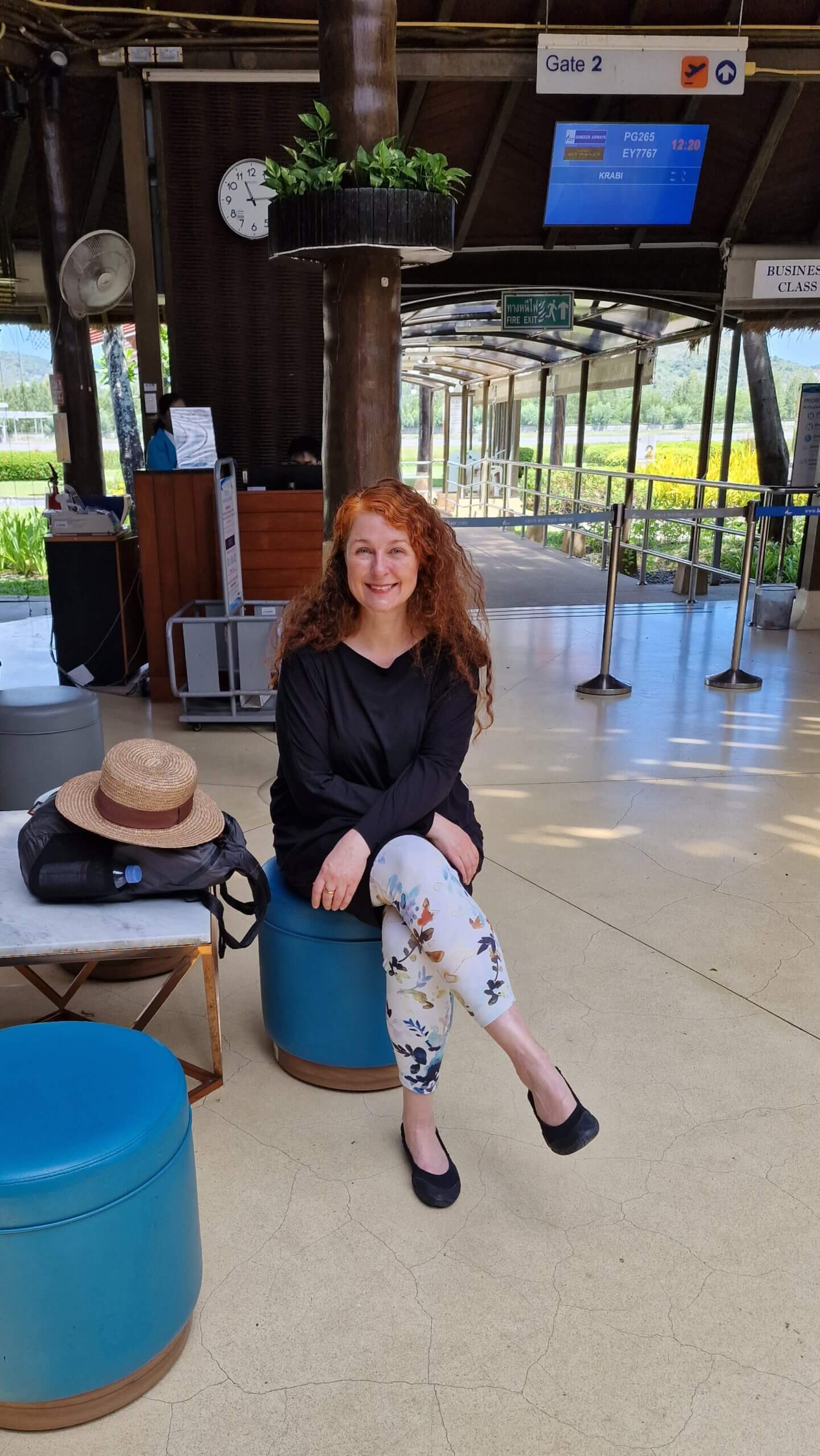 Cerstin wearing her long-haul flight outfit at an airport gate